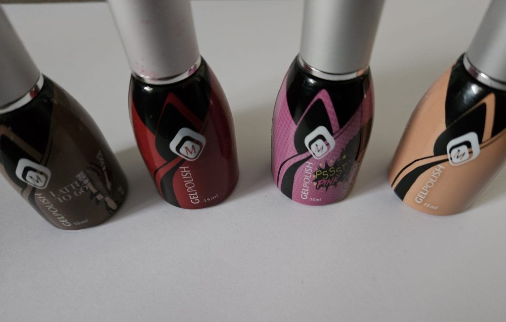 Vier flesjes Magnetic gelpolish in verschillende kleuren